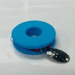 Trout Aea Sports Schleppsystem mit silbernem Spinnerblatt auf Schaumroellchen