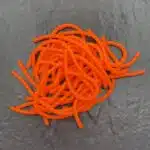 Ein Haufen Forellen Gummikoeder RIP No 8 in orange