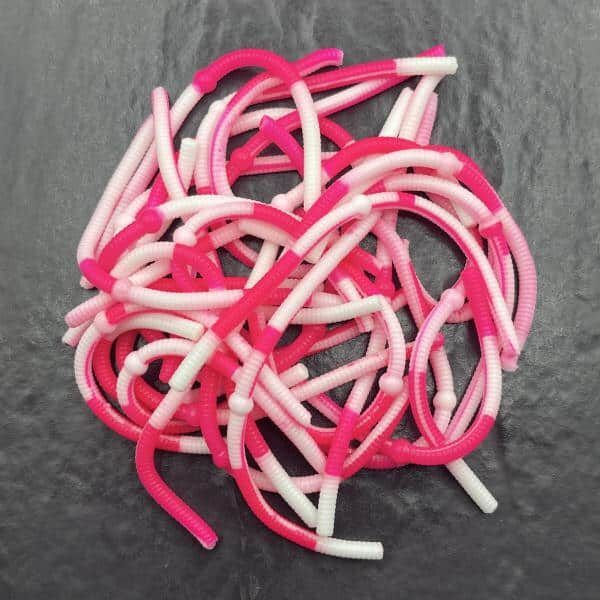 Ein Haufen Forellen Gummikoeder RIP No 8 in weiss pink